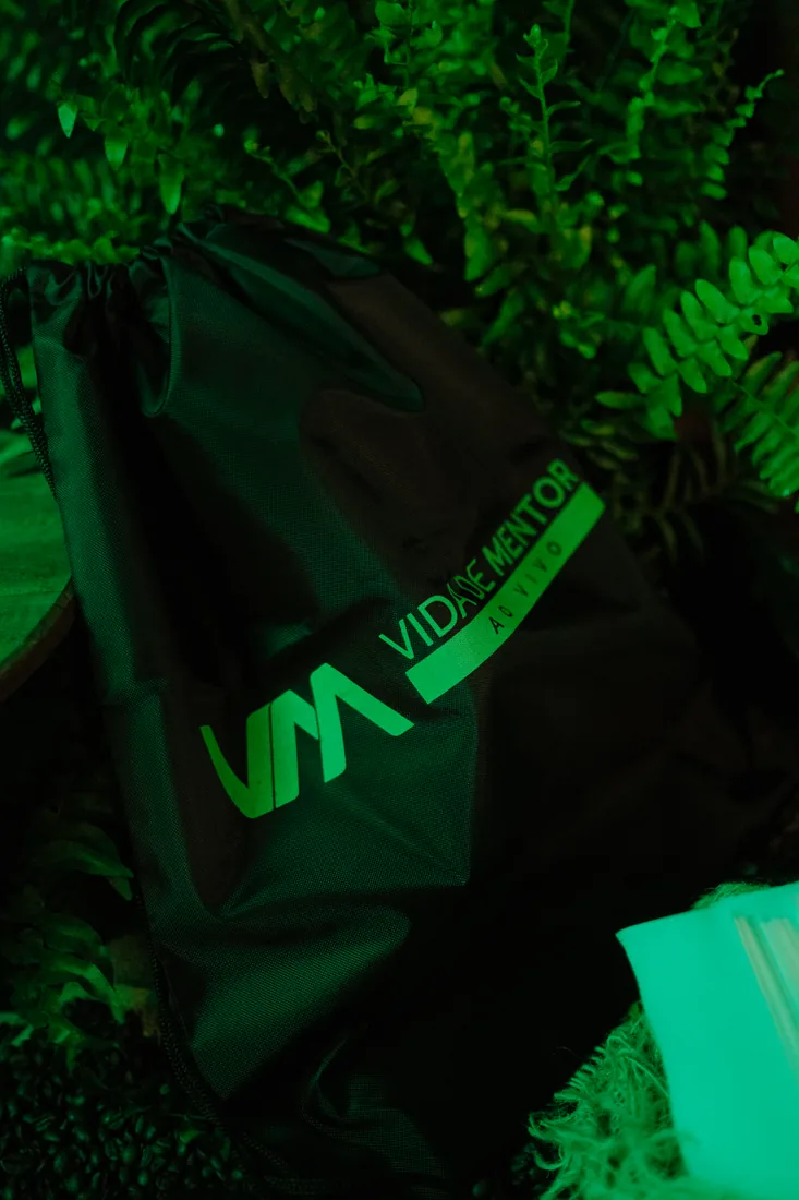 Mochila do evento com o logotipo Vida de Mentor ao Vivo